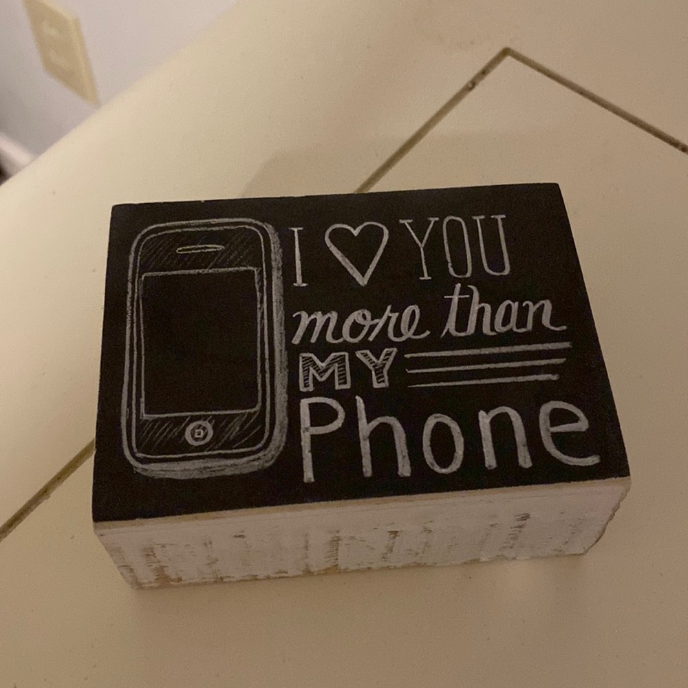 “I love you more than my phone” wooden block sign
